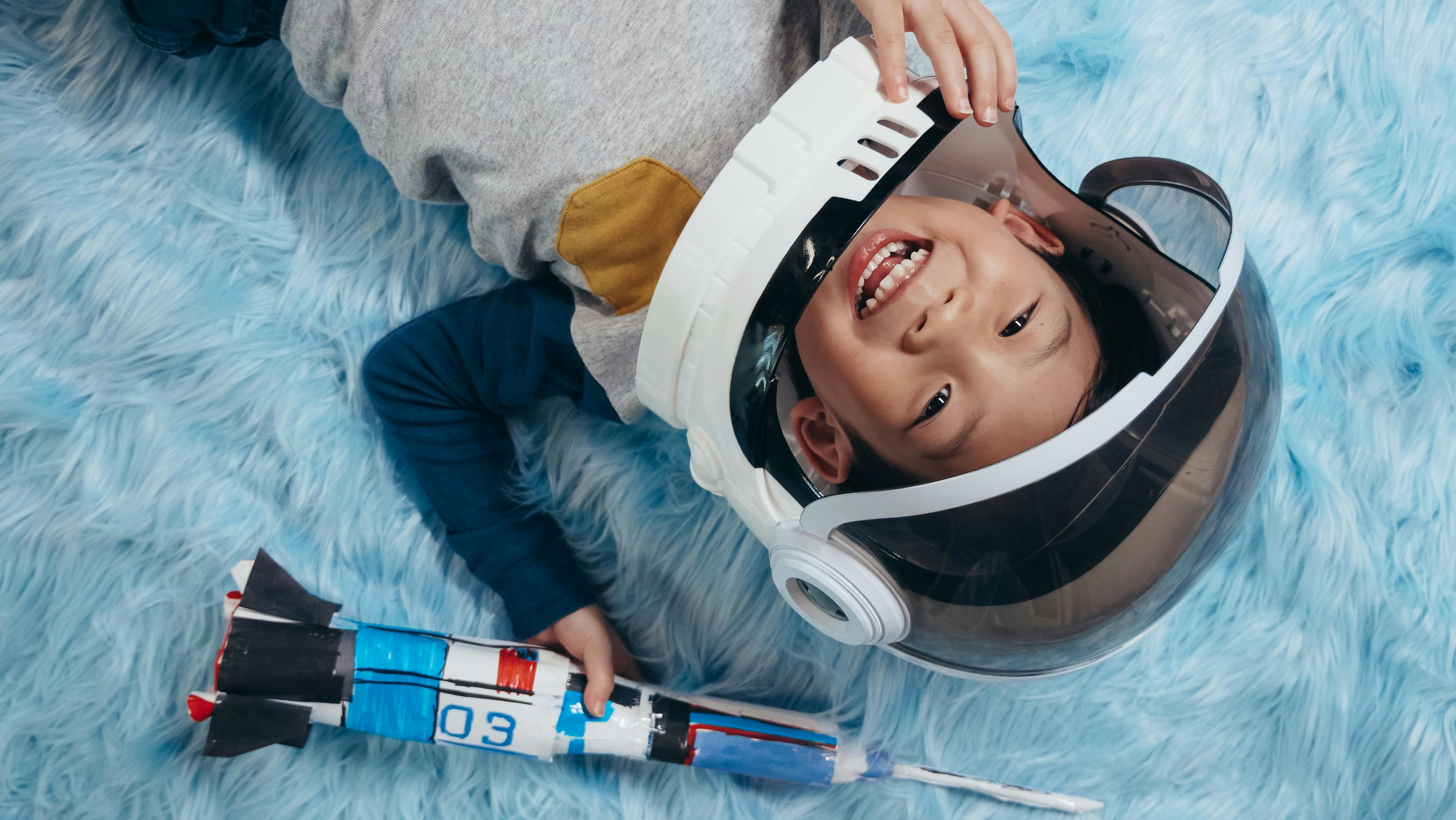 Child exploring moon-themed activities